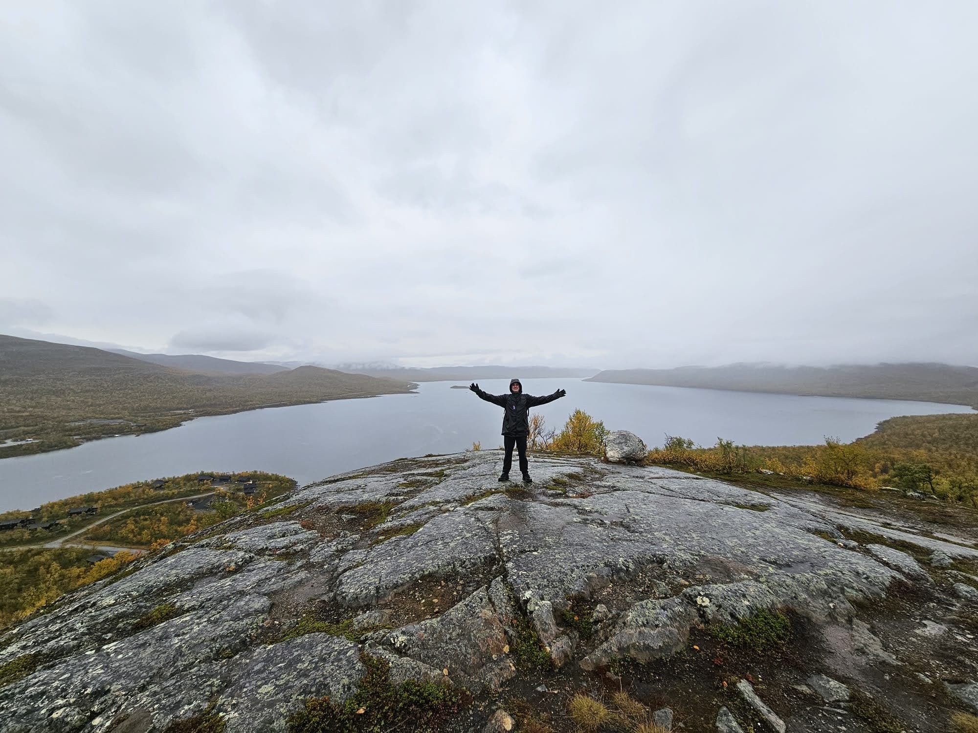 Jere at an overlook above a lake in Kilpisjärvi